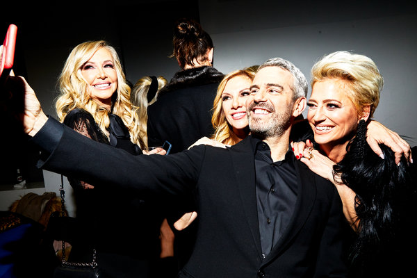 From left, Shannon Beador (“The Real Housewives of Orange County”), Ramona Singer (“The Real Housewives of New York City”), Andy Cohen (of Bravo) and Dorinda Medley (also of “New York City”) mug for a selfie.Credit...